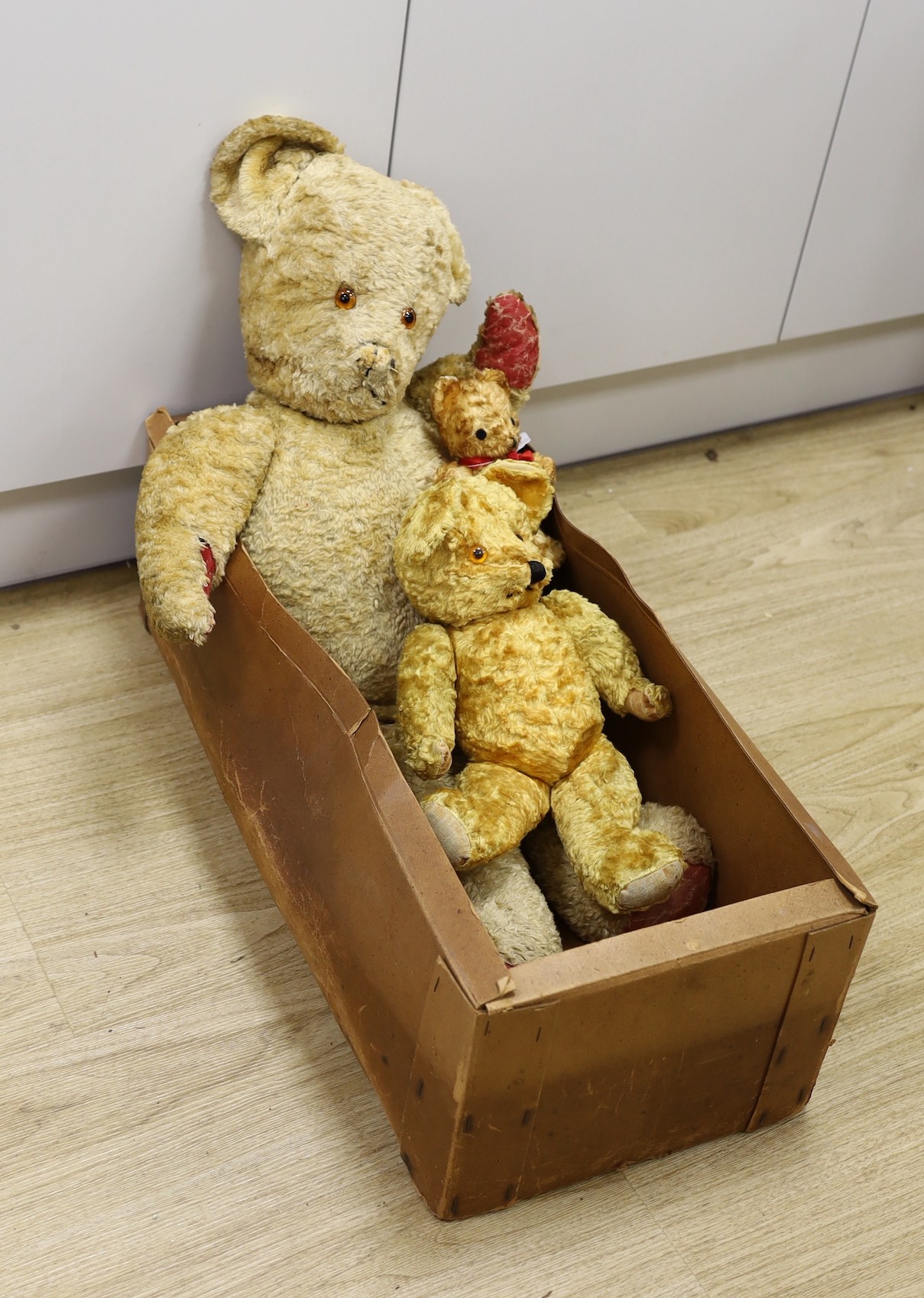 Three 20th century, 1950’s cotton plush teddy bears, tallest 78 cms high